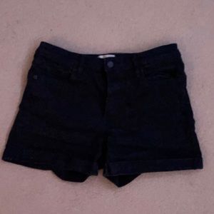 Black jean shorts.